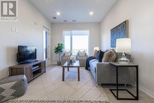 302 - 3265 Carding Mill Trail, Oakville, ON - Indoor Photo Showing Living Room