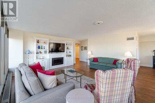 710 - 2045 Lake Shore Boulevard W, Toronto, ON - Indoor Photo Showing Living Room With Fireplace