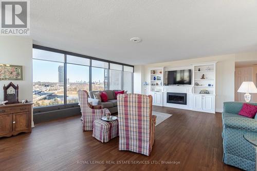 710 - 2045 Lake Shore Boulevard W, Toronto, ON - Indoor Photo Showing Living Room With Fireplace