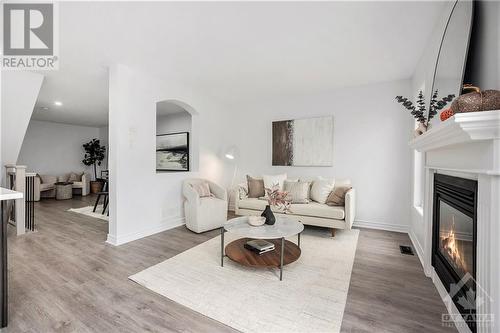 310 Ventanna Street, Ottawa, ON - Indoor Photo Showing Living Room With Fireplace