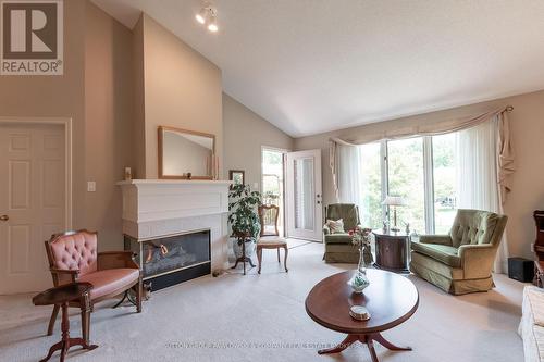 18 - 499 Teeple Terrace, London, ON - Indoor Photo Showing Living Room With Fireplace