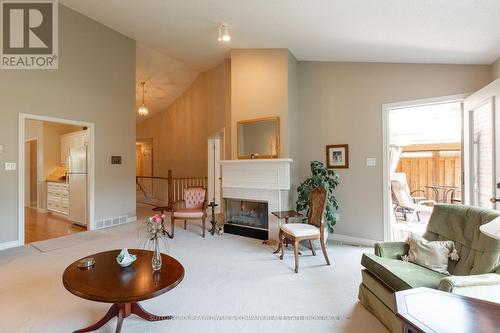 18 - 499 Teeple Terrace, London, ON - Indoor Photo Showing Living Room With Fireplace