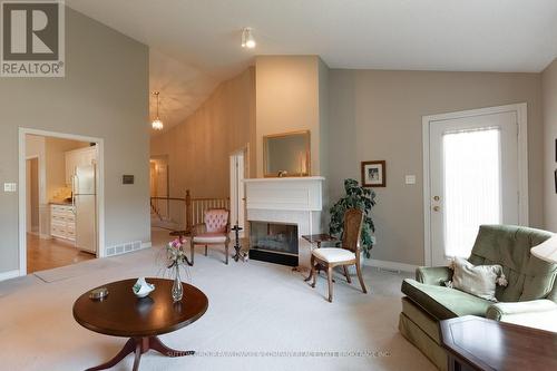 18 - 499 Teeple Terrace, London, ON - Indoor Photo Showing Living Room With Fireplace