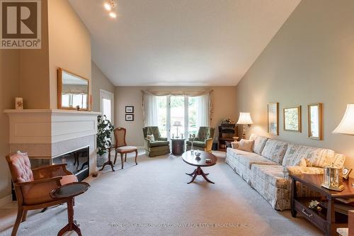 18 - 499 Teeple Terrace, London, ON - Indoor Photo Showing Living Room With Fireplace