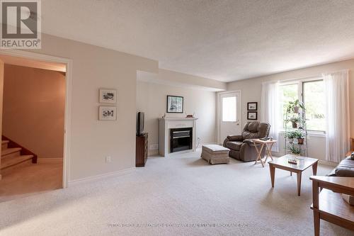 18 - 499 Teeple Terrace, London, ON - Indoor Photo Showing Living Room With Fireplace