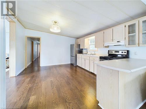 Kitchen and hallway - 332 Concession 6 Unit# 11, Port Elgin, ON - Indoor Photo Showing Kitchen