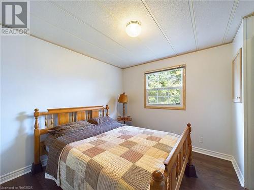 Secondary bedroom with closet - 332 Concession 6 Unit# 11, Port Elgin, ON - Indoor Photo Showing Bedroom