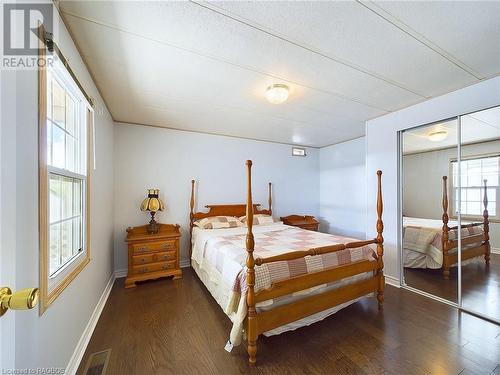 Primary bedroom with large closet - 332 Concession 6 Unit# 11, Port Elgin, ON - Indoor Photo Showing Bedroom