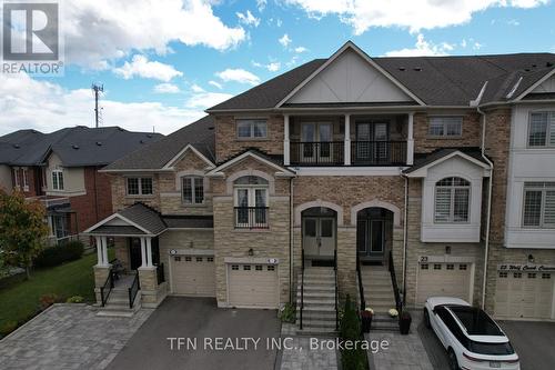 21 Wolf Creek Crescent, Vaughan, ON - Outdoor With Balcony With Facade