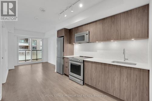 308 - 30 Samuel Wood Way, Toronto, ON - Indoor Photo Showing Kitchen With Upgraded Kitchen