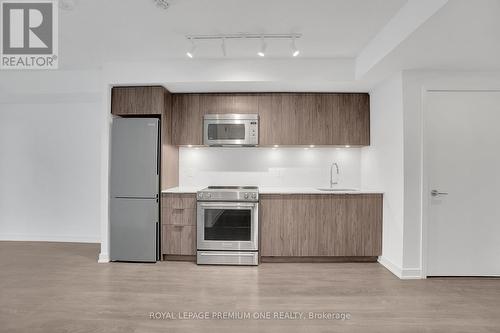 308 - 30 Samuel Wood Way, Toronto, ON - Indoor Photo Showing Kitchen