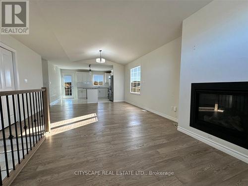 1057 Aspen Ridge Crescent, Lakeshore, ON - Indoor Photo Showing Living Room With Fireplace