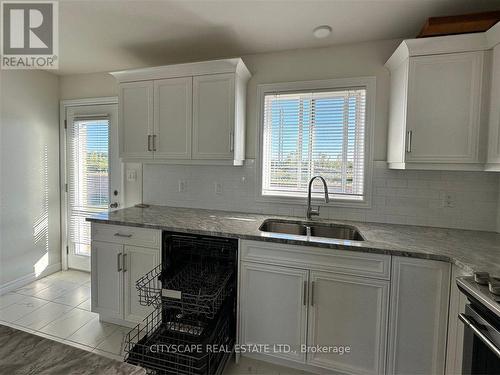 1057 Aspen Ridge Crescent, Lakeshore, ON - Indoor Photo Showing Kitchen With Double Sink