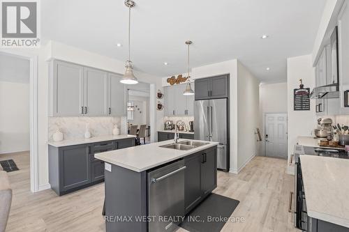 133 Mcfarlane Crescent, Centre Wellington, ON - Indoor Photo Showing Kitchen With Stainless Steel Kitchen With Double Sink With Upgraded Kitchen