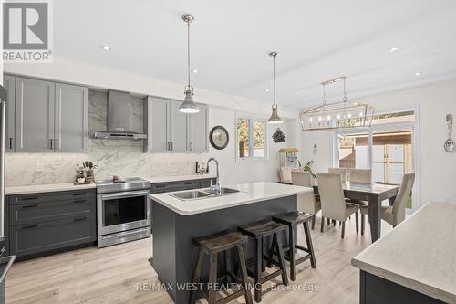 133 Mcfarlane Crescent, Centre Wellington, ON - Indoor Photo Showing Kitchen With Stainless Steel Kitchen With Double Sink With Upgraded Kitchen