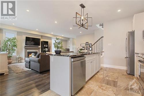 33 Borland Drive, Carleton Place, ON - Indoor Photo Showing Kitchen With Fireplace With Upgraded Kitchen