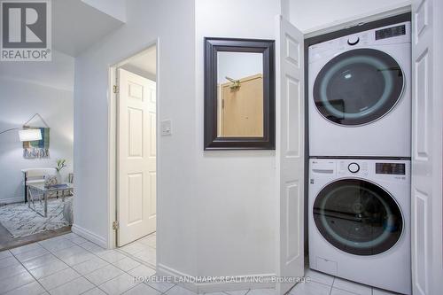 306 - 24 Wellesley Street W, Toronto, ON - Indoor Photo Showing Laundry Room