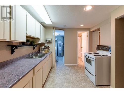 149 111 S Tabor Boulevard, Prince George, BC - Indoor Photo Showing Kitchen With Double Sink