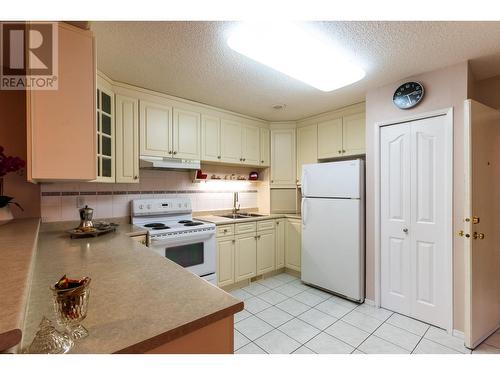 149 111 S Tabor Boulevard, Prince George, BC - Indoor Photo Showing Kitchen