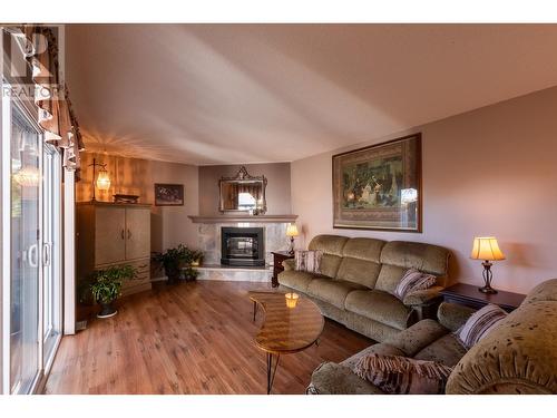 149 111 S Tabor Boulevard, Prince George, BC - Indoor Photo Showing Living Room With Fireplace