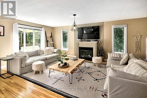 136 Maple Lane, Blue Mountains, ON - Indoor Photo Showing Living Room With Fireplace