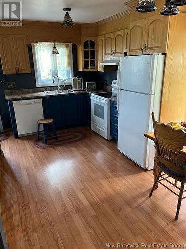 103 Lavigne Lane, Dalhousie, NB - Indoor Photo Showing Kitchen With Double Sink