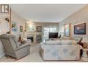 3880 Brown Road Unit# 310, West Kelowna, BC  - Indoor Photo Showing Living Room With Fireplace 