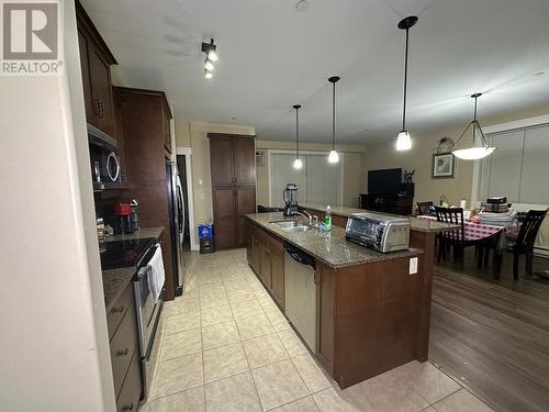 795 Mcgill Road Unit# 201, Kamloops, BC - Indoor Photo Showing Kitchen With Double Sink