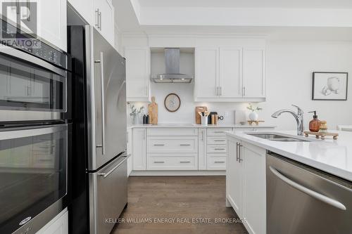 2 - 325 Lakebreeze Drive, Clarington (Newcastle), ON - Indoor Photo Showing Kitchen With Stainless Steel Kitchen With Double Sink