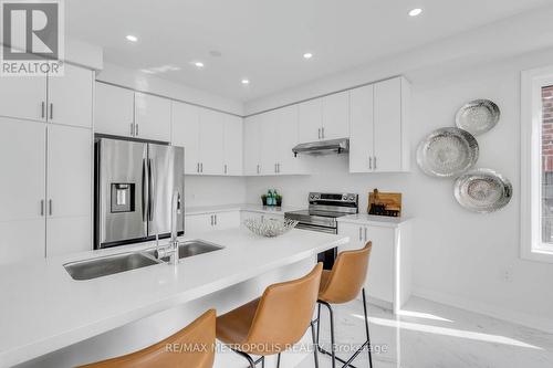 58 Belmont Drive, Clarington, ON - Indoor Photo Showing Kitchen With Double Sink With Upgraded Kitchen