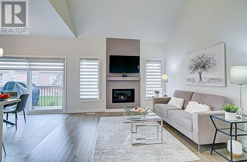 4 Clermiston Crescent, Brampton, ON - Indoor Photo Showing Living Room With Fireplace