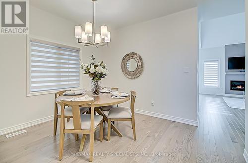 4 Clermiston Crescent, Brampton, ON - Indoor Photo Showing Dining Room With Fireplace