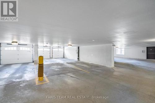 307 - 375 Lakebreeze Drive, Clarington, ON - Indoor Photo Showing Garage