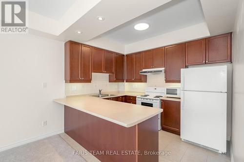 307 - 375 Lakebreeze Drive, Clarington, ON - Indoor Photo Showing Kitchen With Double Sink