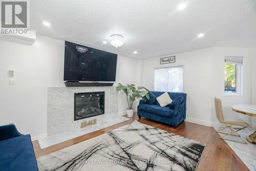 35 Jones Drive, Barrie, ON - Indoor Photo Showing Living Room With Fireplace