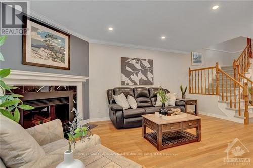 25 Sarrazin Way, Ottawa, ON - Indoor Photo Showing Living Room With Fireplace