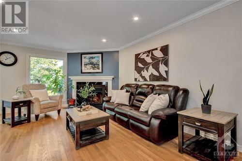 25 Sarrazin Way, Ottawa, ON - Indoor Photo Showing Living Room With Fireplace