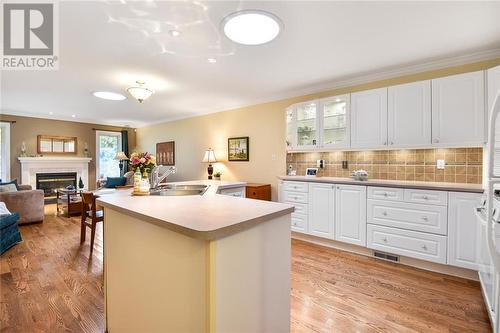 266 Church Street, Brockville, ON - Indoor Photo Showing Kitchen With Fireplace With Double Sink