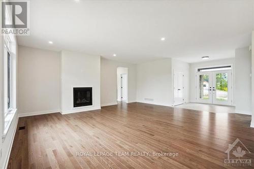 46 Tennant Drive, Rideau Lakes, ON - Indoor Photo Showing Living Room With Fireplace