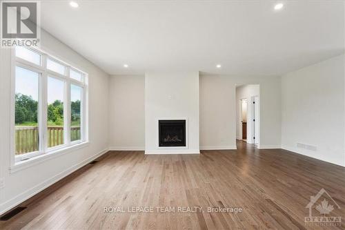 46 Tennant Drive, Rideau Lakes, ON - Indoor Photo Showing Living Room With Fireplace