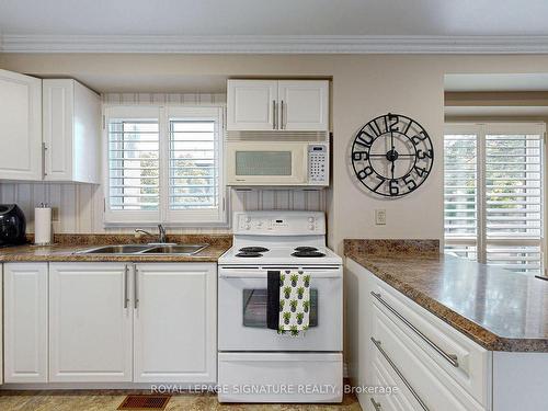 120-24 Fundy Bay Blvd, Toronto, ON - Indoor Photo Showing Kitchen With Double Sink