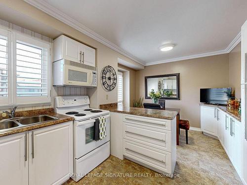 120-24 Fundy Bay Blvd, Toronto, ON - Indoor Photo Showing Kitchen With Double Sink