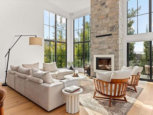 Living room - 165 Rue De Rouville, Bromont, QC - Indoor Photo Showing Living Room With Fireplace