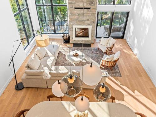 Interior - 165 Rue De Rouville, Bromont, QC - Indoor Photo Showing Living Room With Fireplace