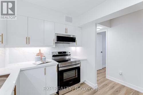 204 - 39 Kimbercroft Court, Toronto, ON - Indoor Photo Showing Kitchen