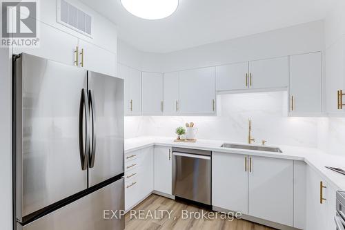 204 - 39 Kimbercroft Court, Toronto, ON - Indoor Photo Showing Kitchen With Upgraded Kitchen