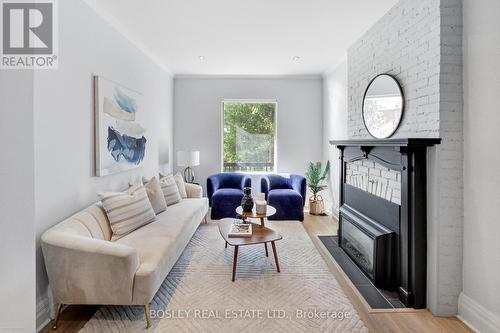 11 Bertmount Avenue, Toronto, ON - Indoor Photo Showing Living Room With Fireplace