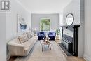 11 Bertmount Avenue, Toronto, ON  - Indoor Photo Showing Living Room With Fireplace 