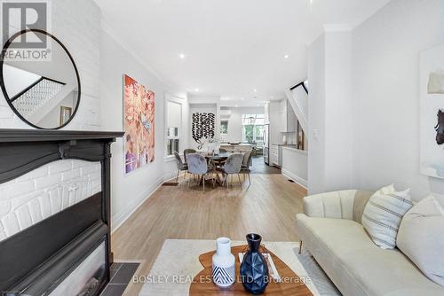 11 Bertmount Avenue, Toronto, ON - Indoor Photo Showing Other Room With Fireplace