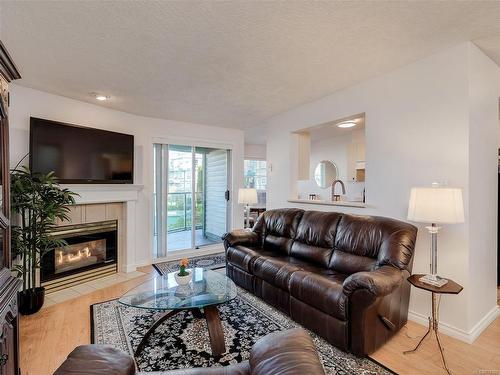 212-898 Vernon Ave, Saanich, BC - Indoor Photo Showing Living Room With Fireplace